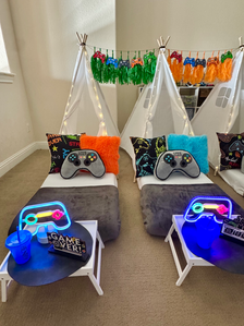 Gaming-inspired sleepover tent with themed accent cushions
