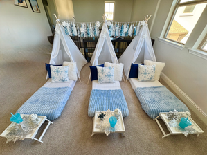 Snowflakes winter sleepover tents decorated with icy blue, silver and white details