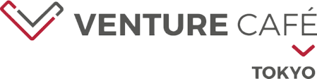 Venture Cafe Tokyo logo badge.