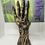 Thumbnail: Skeleton Hand Book Display: Gothic Library Decor