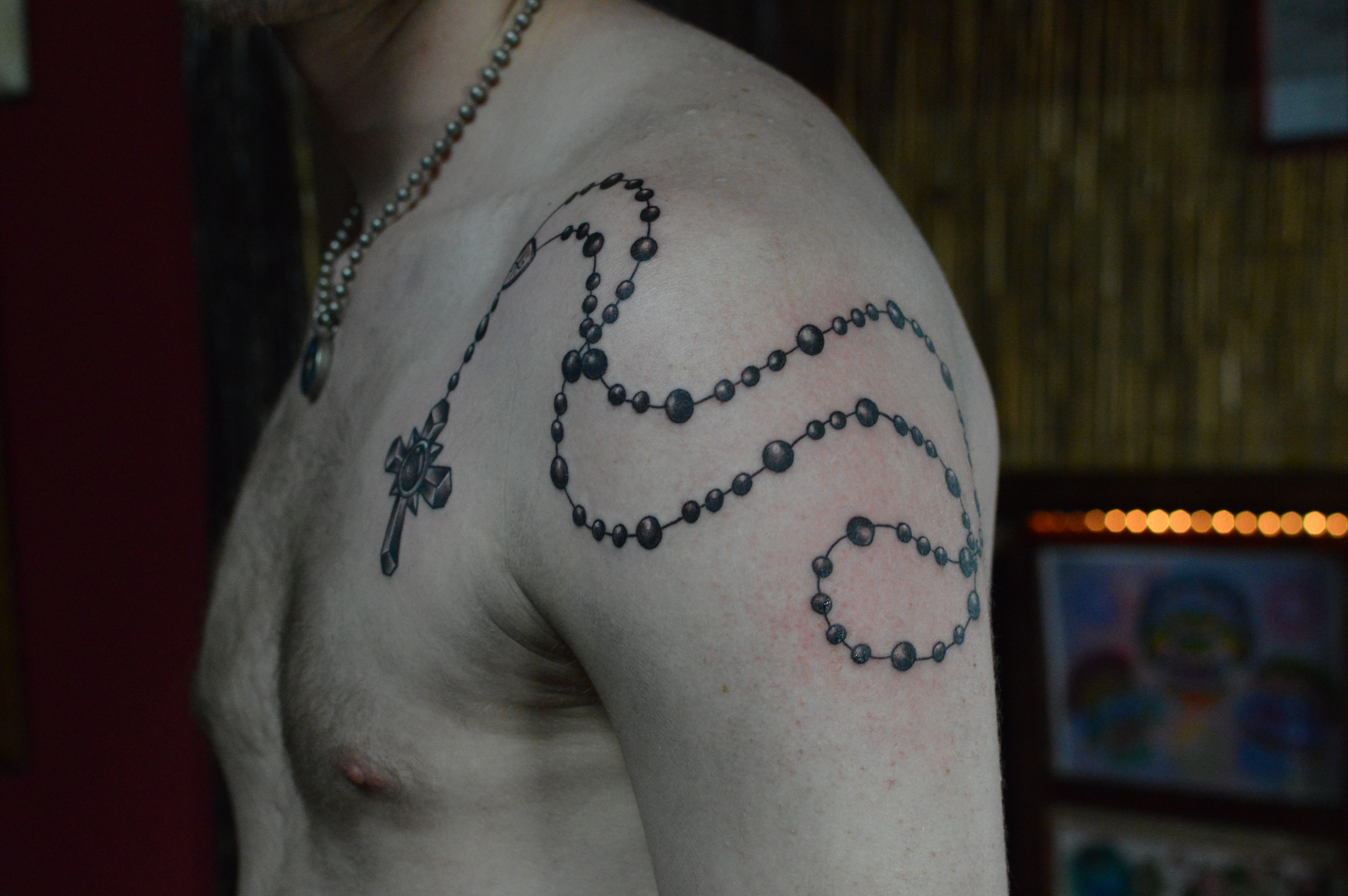 Prayer beads tattoo