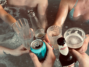 group of non monogamy lifestylers in a hot tub at a swinging weekend