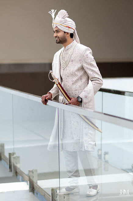 Atul posing for a groom portrait at his Jaipur wedding