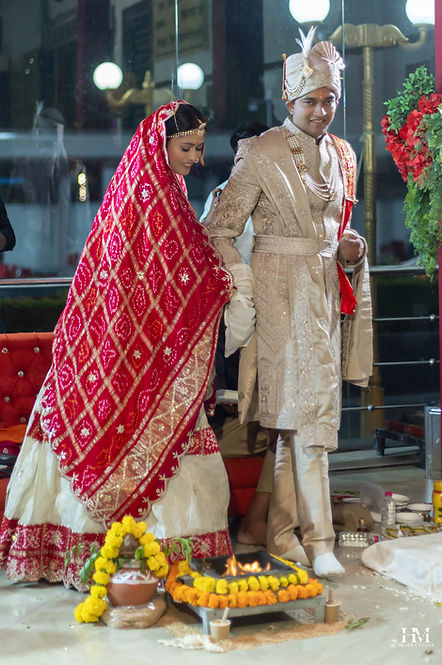 Bride and groom walking together during their wedding ceremony