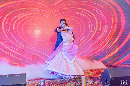 Bride and groom dancing at their destination wedding in Vrindavan
