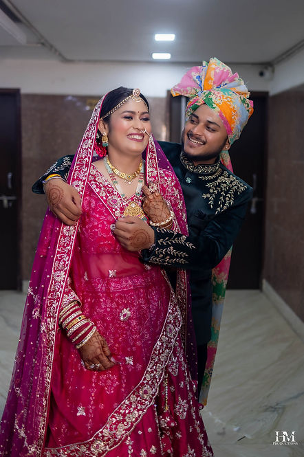Bride and brother sharing a candid moment during the wedding