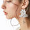 Thumbnail: White Floral Pearl with Butterfly Drop Earrings