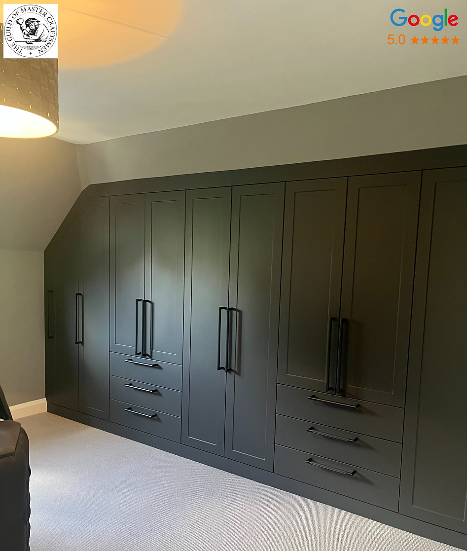 Large, Luxury floor to ceiling bespoke fitted wardrobe with drawers