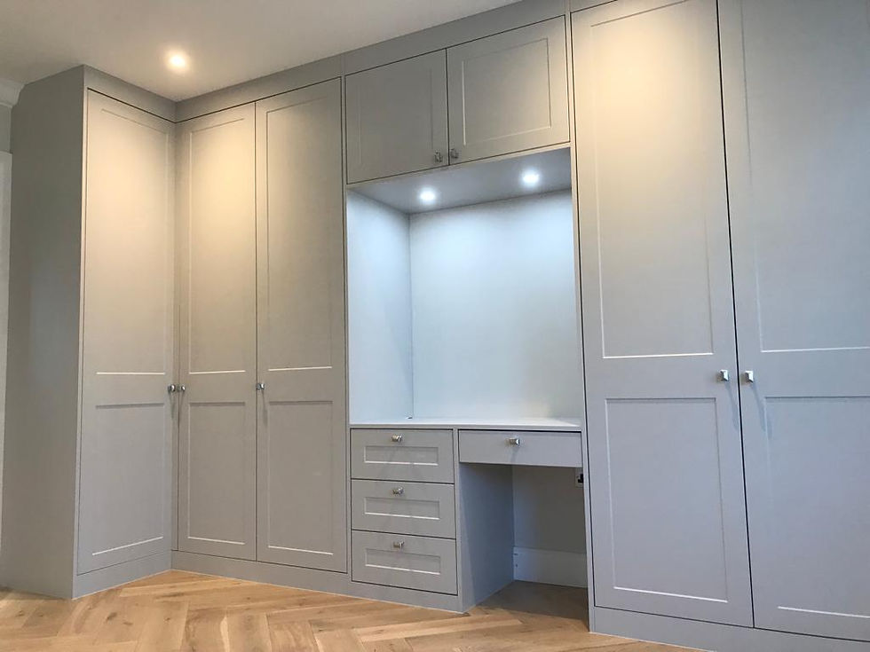 Matt dove grey corner unit fully bespoke wardrobe with dresser