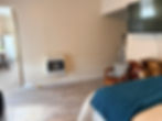 Wall mounted gas fire as seen from studio seating area