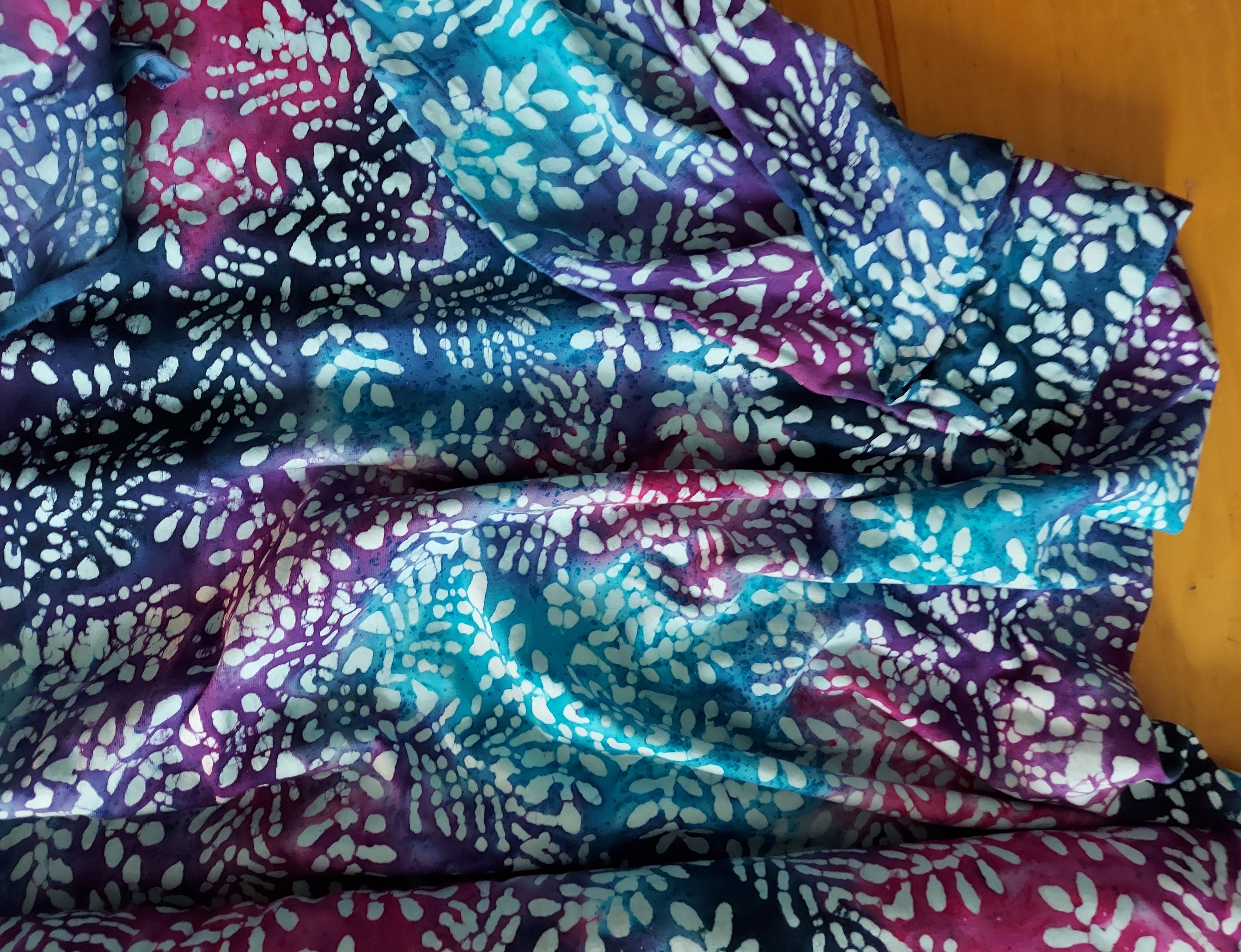 Absolute Knit- Batik Floral Fuchsia, Blue, Purple by Textile Creations