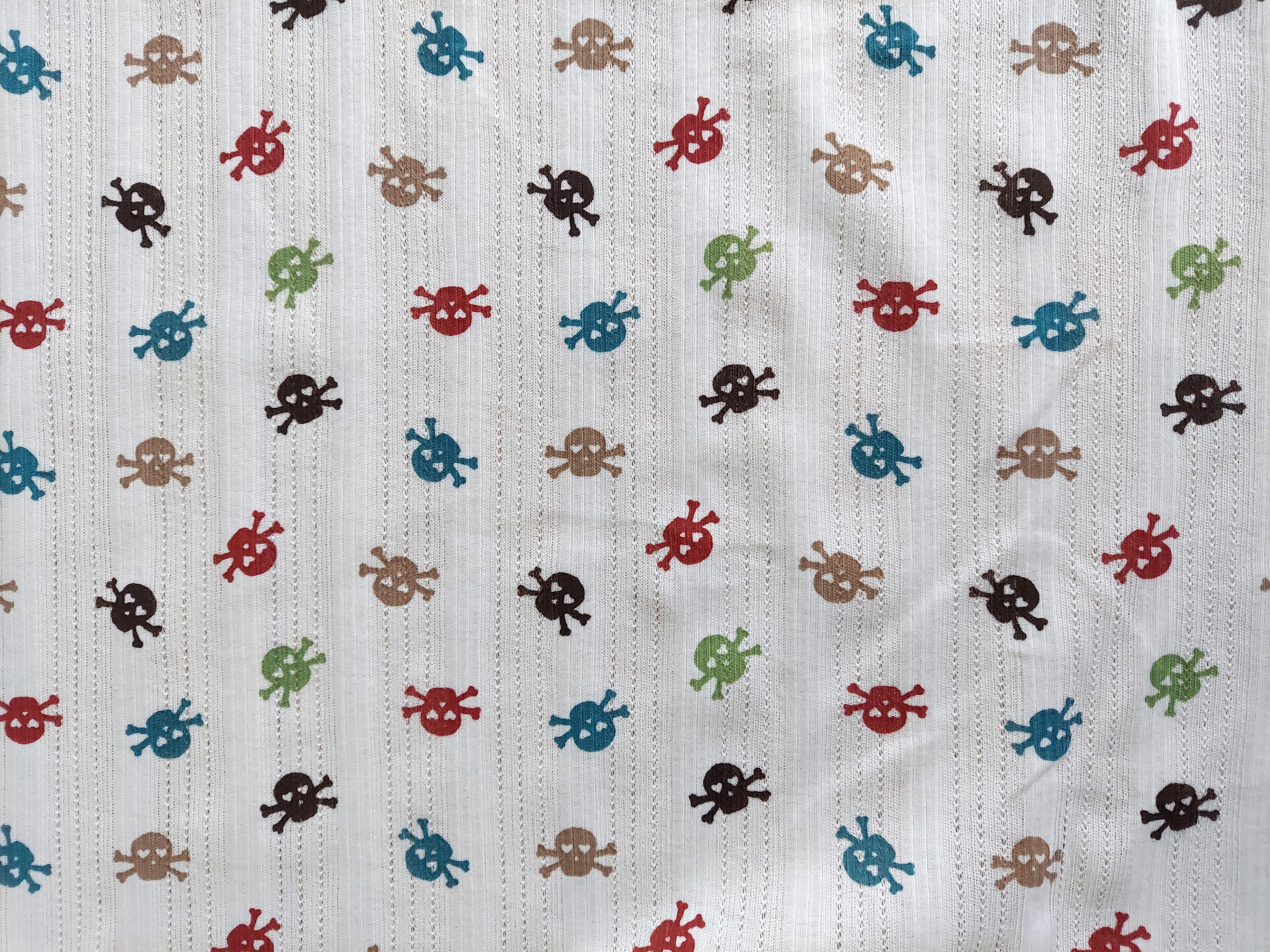 Skull Print on White Ribbed Knit Fabric