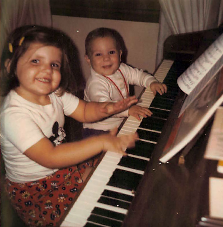 Michelle Dettmann and her brother Dave ”play” their family’s piano in the mid-1970s. Her parents sang alto-tenor duets, often for funerals, and also in church choirs. Contributed photo
