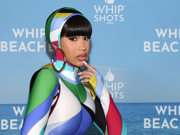 Cardi B Embraces Whimsical Style in Colorful Emilio Pucci Catsuit at Whipshots Summer Party