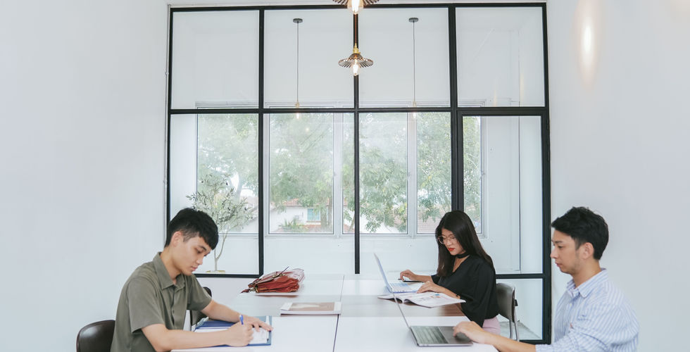 Diverse Individuals Uniting Under One Roof for Work at Be Coworking Space.