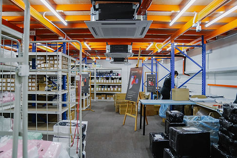 Vast warehouse stocked with a diverse range of resources and products.