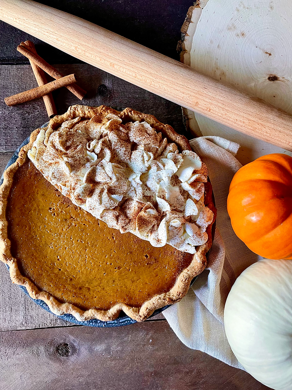 pumpkin pie, food 52, best pie, best pumpkin pie, fall, pumpkin spice, whip cream, cinnamon, hazelnuts, cinnamon sticks, rolling pin, cloves