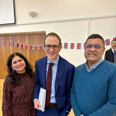 Cllr. Pankit Shah and Vaishali Shah with BBC News correspondent Chris Mason at a media or public affairs event
