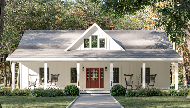 Single-story farmhouse-style home with white exterior, gabled roof, covered front porch with rocking chairs, and tree-lined yard
