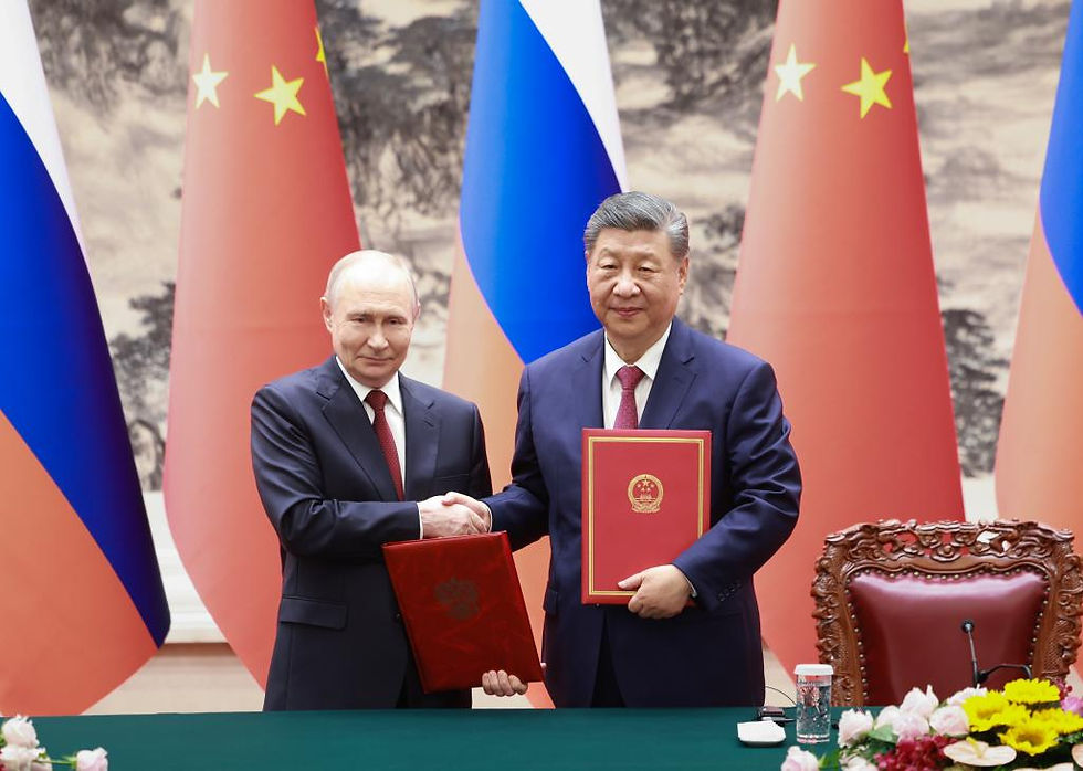 Xi holds talks with Putin in Beijing