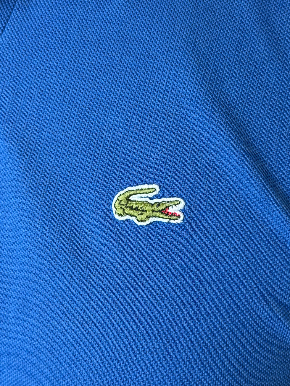 Miniature : Polo Lacoste blanc et bleu taille xl en bon état en coton 