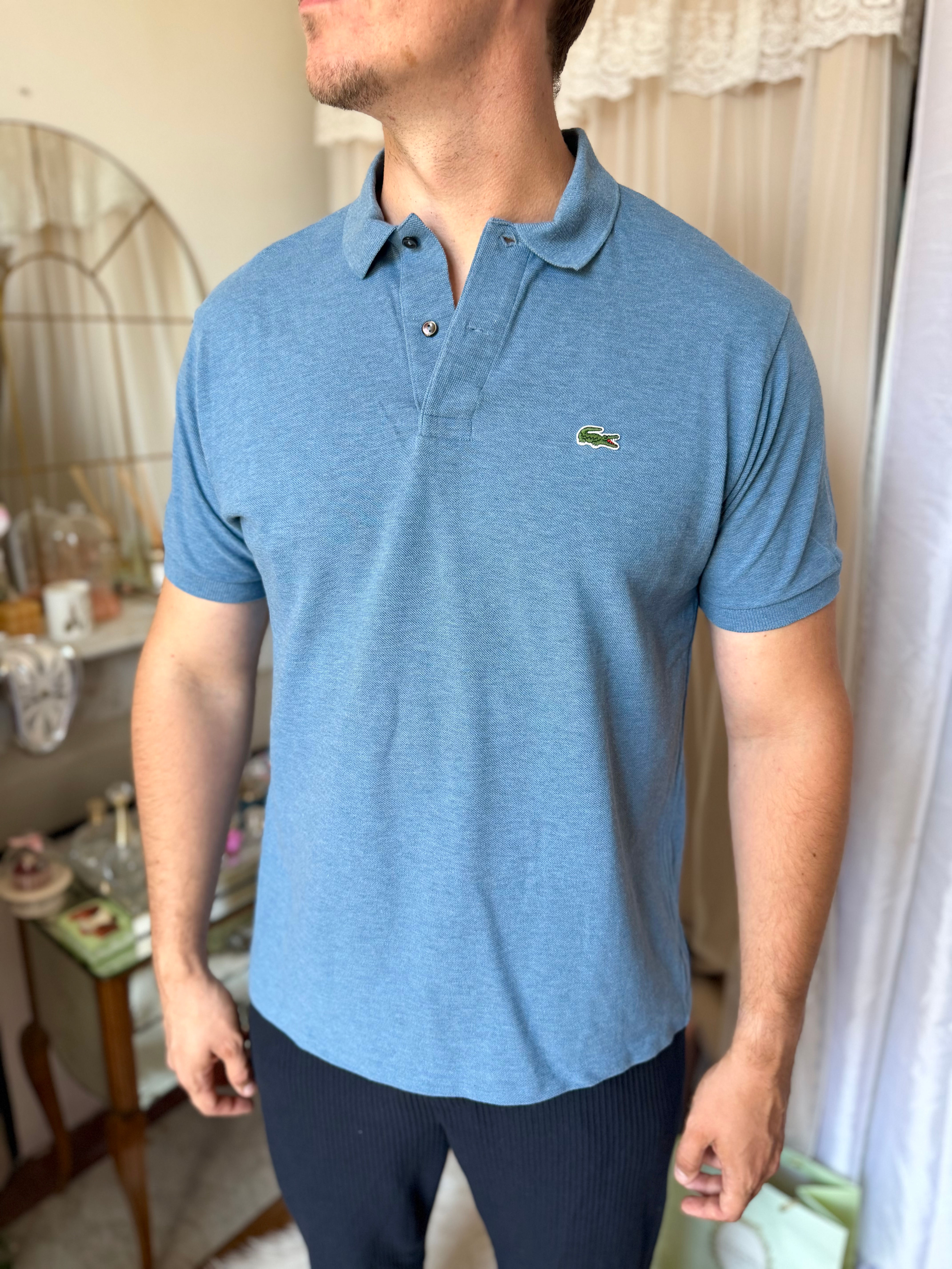 Polo Lacoste xxl bleu en très bon état en coton 