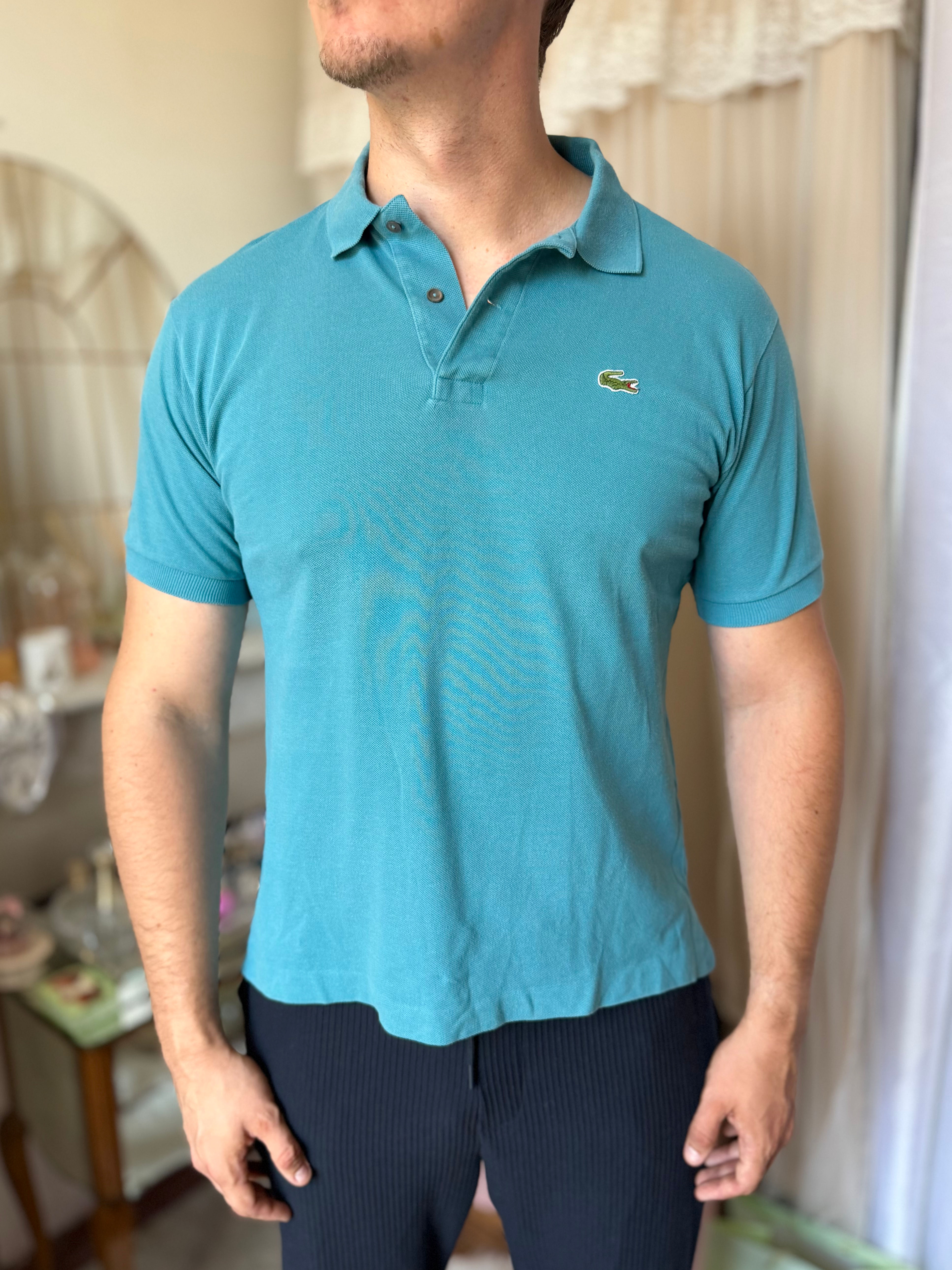 Polo Lacoste bleu turquoise en bon état taille xl en coton 