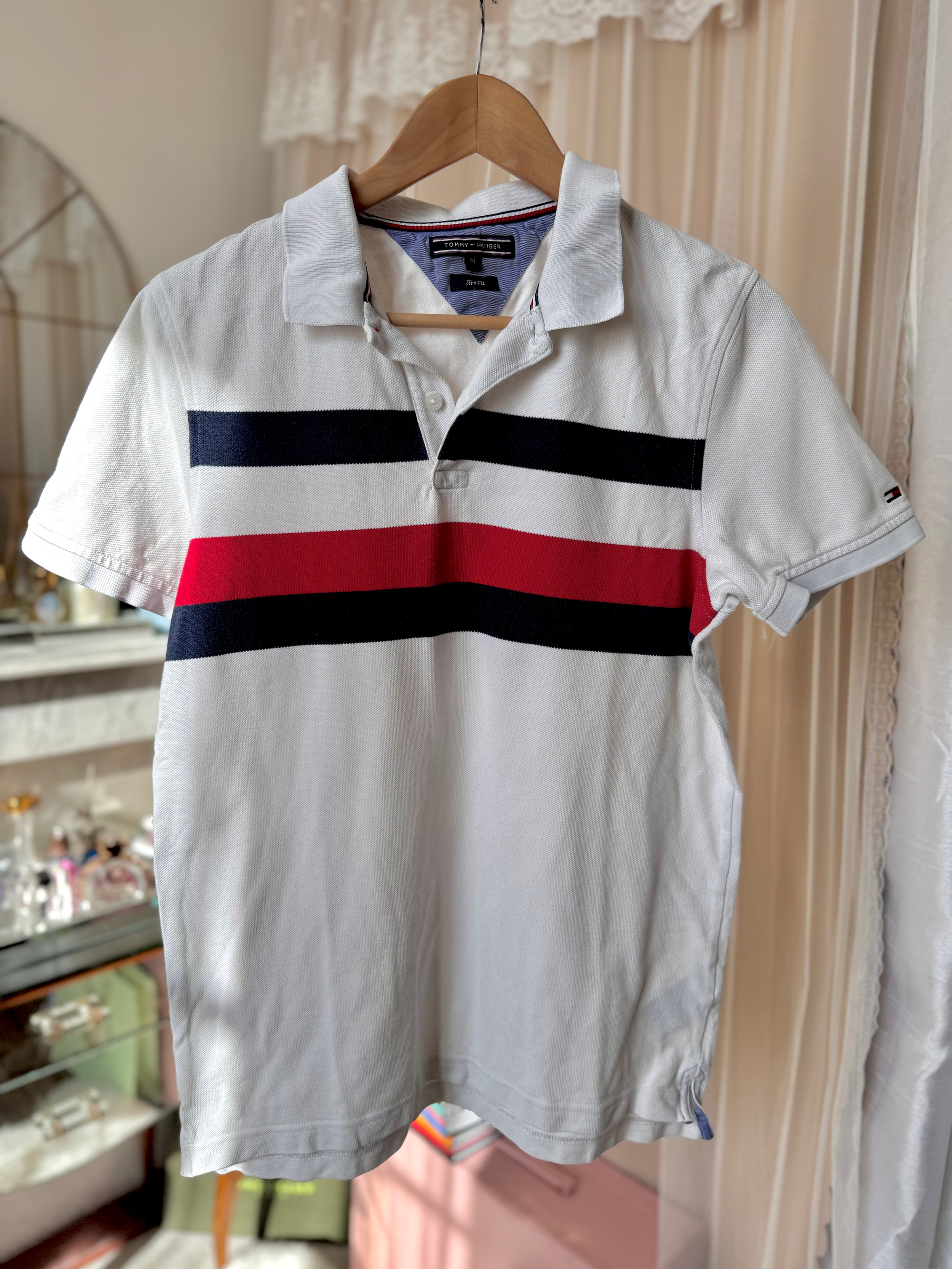 Polo Tommy Hilfiger taille m en très bon état bleu rouge et blanc 