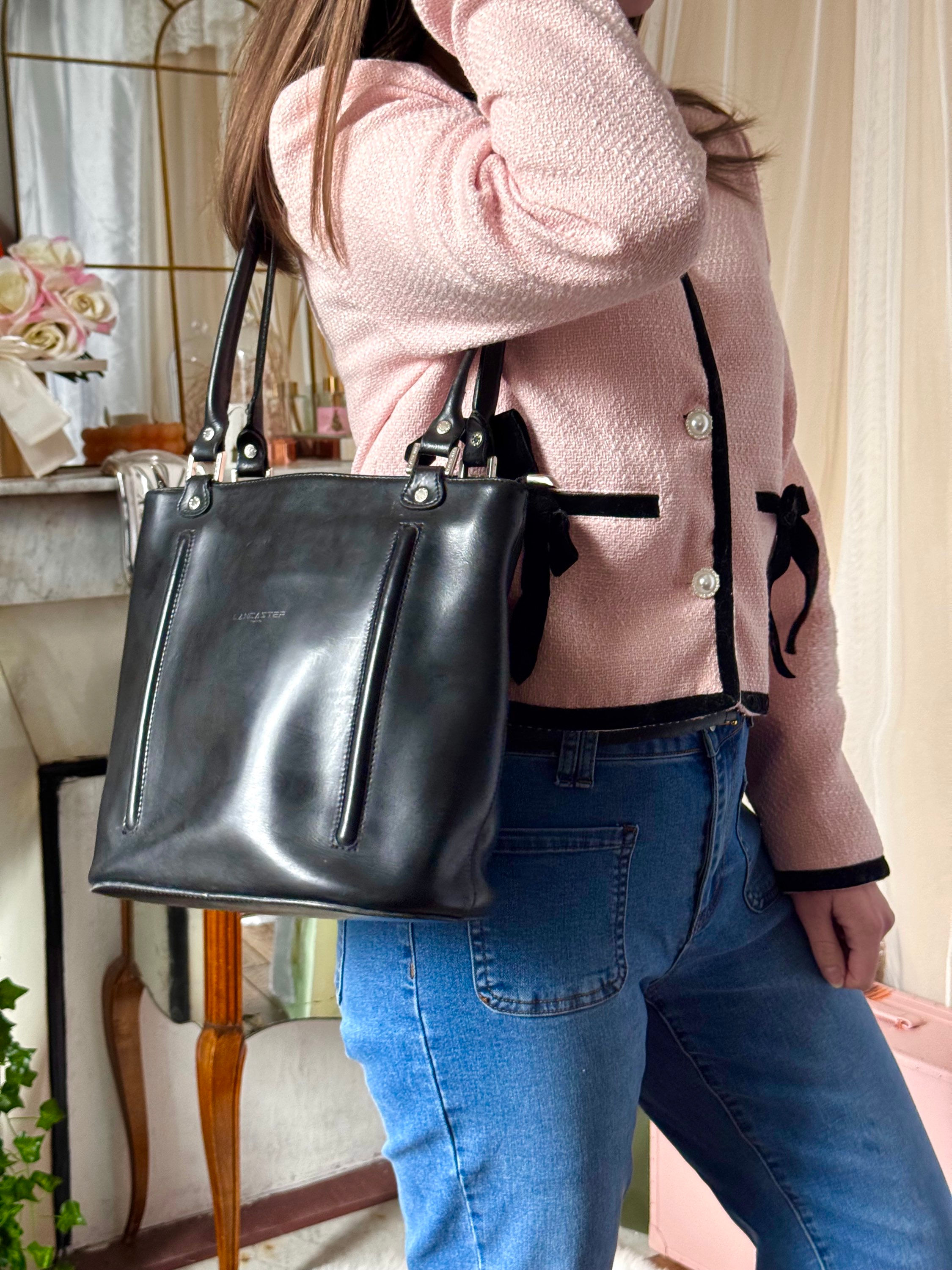 Sac Lancaster noir en bon état en cuir 