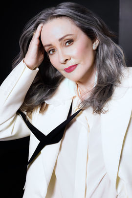PatriciaWhiteSuitBeauty.jpg