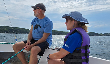 a couole on a sailboat