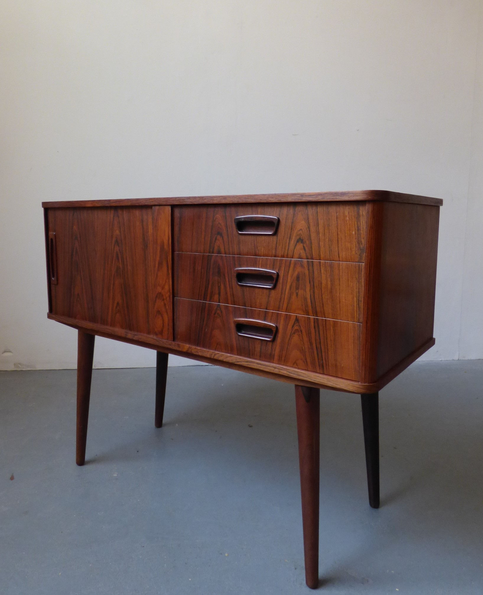 Mid-century Danish rosewood cabinet with tambour door
