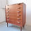 Thumbnail: Mid-century Danish teak tallboy dresser with oak handles
