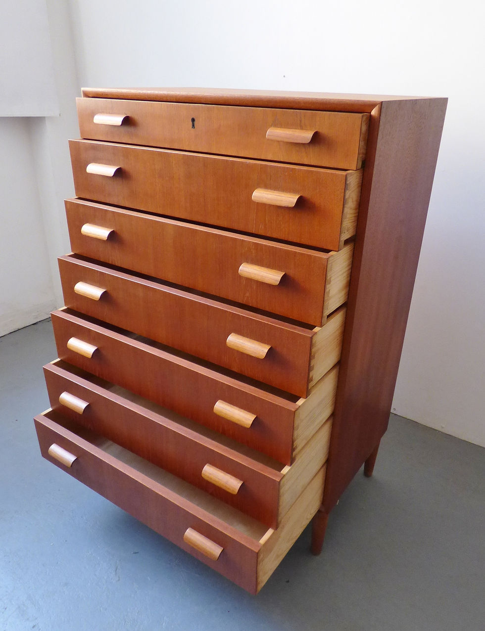 Thumbnail: 1950s Danish teak and oak tallboy chest of 7 drawers