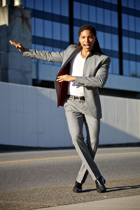 Smiling and professional, Julio Montero completes a dance move with finesse