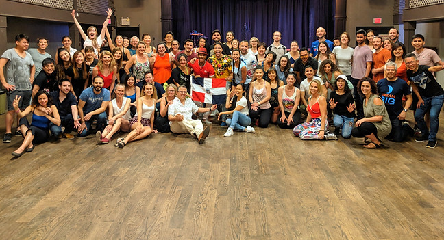 Students taking a group photo at the end of Julio Montero's class at Ukrainian Hall