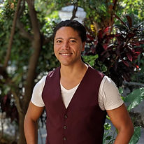 Smiling profile picture of Julio Montero against the backdrop of Vancouver's natural scenery