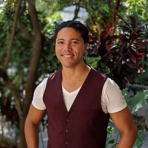 Smiling profile picture of Julio Montero against the backdrop of Vancouver's natural scenery