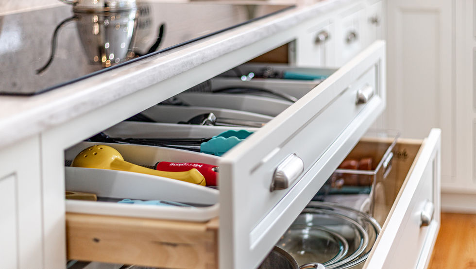Organized kitchen drawer with utensils and tools