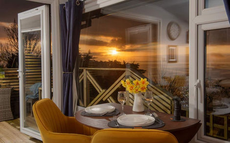 Sunset dining area luxury holiday let.