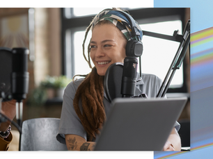 Podcast host smiling in studio, illustrating the case study of a successful podcast advertising campaign for brands.