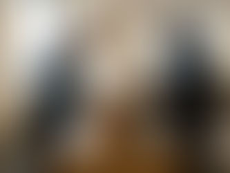 Office coordinator hands off package to courier