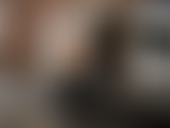 Courier delivering parcel at UK office entrance