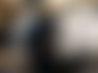 Courier loads package into van for urgent delivery