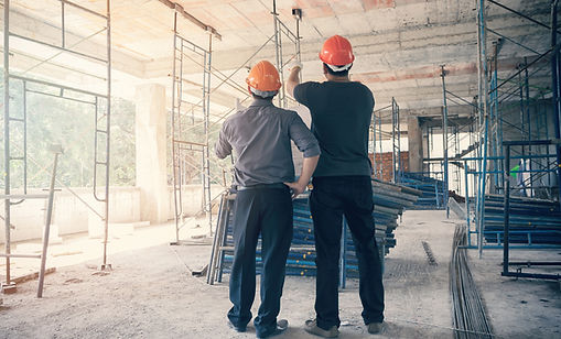 2 men contruction interior scaffolding