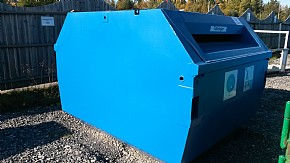 Direkttömmande container