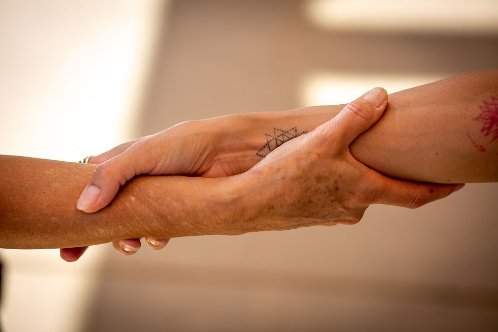 Two hands reaching out to eachother