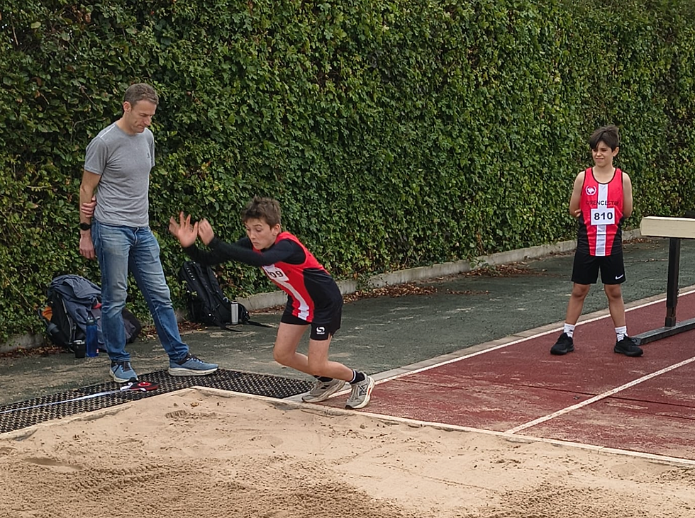 Alfie admiring William's great form in the Standing Long Jump
