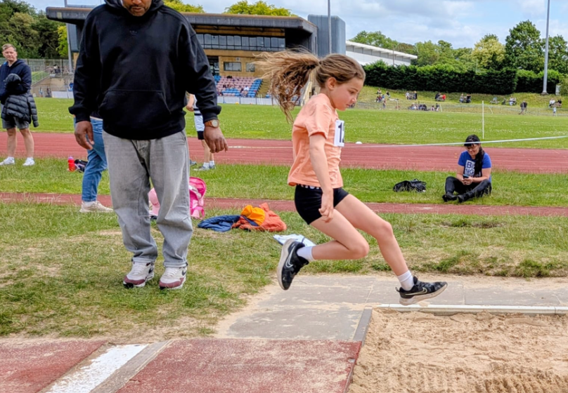 Alice Parry doing Long Jump at a Low Key Open