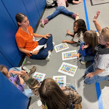 children engaging with nursing student at TigerCHAT